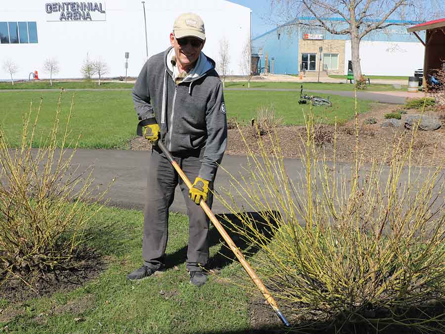 Orville Enns and his wife Anna have taken on tending to the shrubs at the Greg Ens Memorial Park