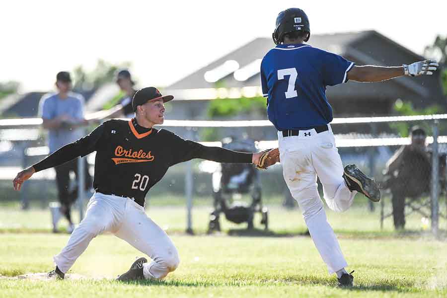 Pembina Valley Orioles first baseman Jaren Hildebrand records the out on Interlake Blue Jays batter Keenan Allen during MJBL action at Arctic Field on June 10. The Blue Jays earned a 4-1 victory