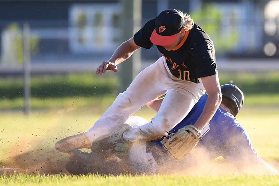 Interlake Blue Jays runner Spencer Scheaffer slides safely into second base ahead of the tag from Pembina Valley Orioles infielder Karston Peters during a June 10 MJBL game at Arctic Field. Interlake won 4-1
