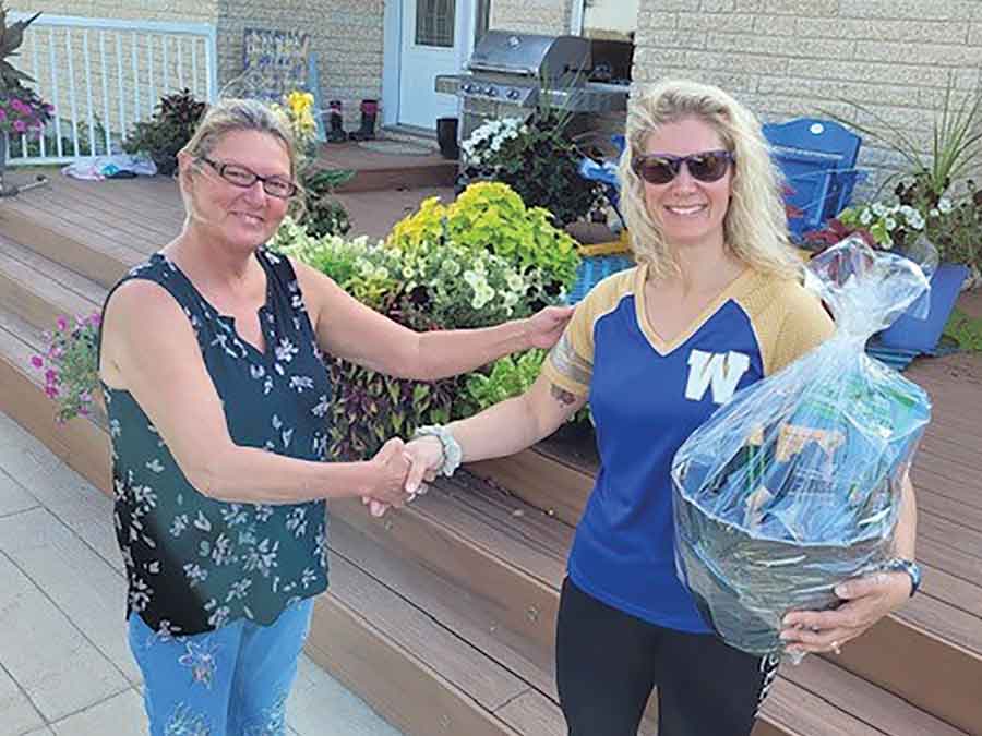 Pictured are winners from a previous Fisher Branch Best Garden Competition