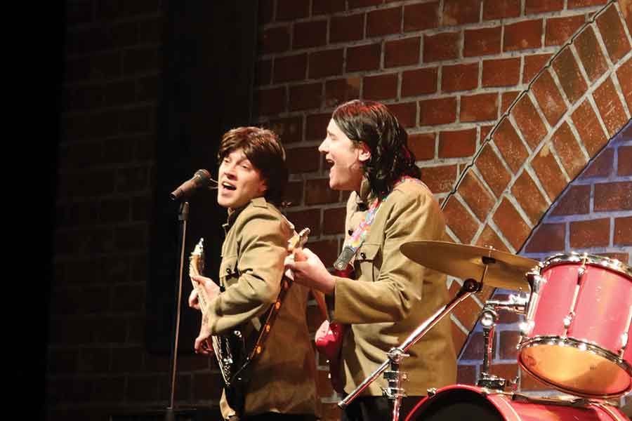 Carman-raised performer Brad Zacharias (right), and Winkler’s Griffin Kehler perform as George Harrison and Paul McCartney in Can’t Buy Me Love – The Beatles Forever at Destination Dinner Stage