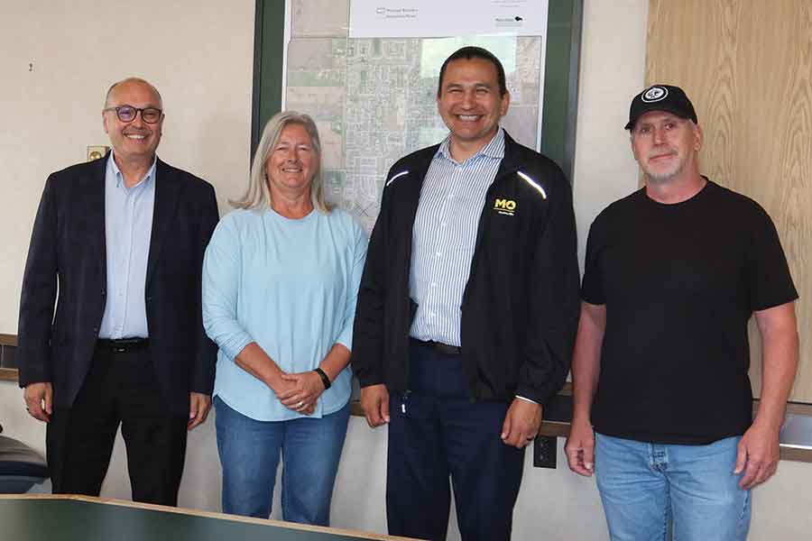 Municipal Emergency Coordinator Dennis Peterson, CAO Wally Melnyk, Mayor Sandra Smith and Manitoba Premier Wab Kinew meet in the Stonewall board room on June 11 to discuss recovery efforts following the historic flooding that affected the community