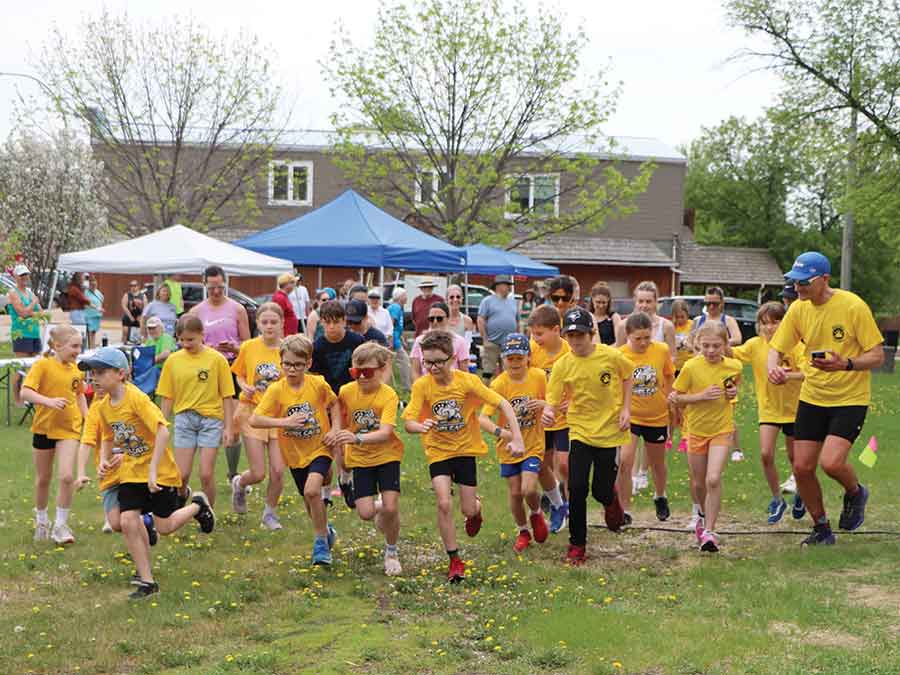 Participants gather at the starting line for the Habitat for Humanity Carman-Dufferin Run and Walk fundraiser on May 30. The event attracted 65 registered runners and walkers and raised approximately $3,700 to support Habitat’s local home-building efforts