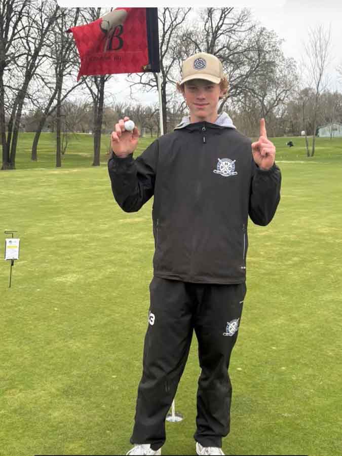 Oliver William Sisson, 13, celebrates his first career hole-in-one after acing the fifth hole at St. Boniface Golf Club during a Maple Leaf Junior Golf Tour event. The ace came on a 140-yard shot with a 9-iron
