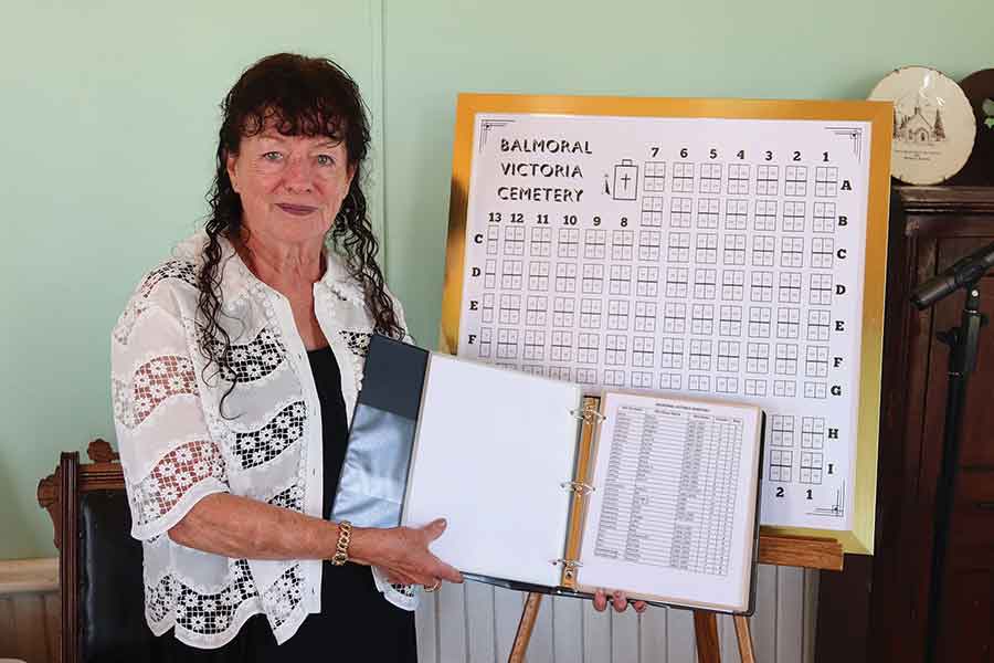 Shirley Williams unveils the new Victoria Cemetery map and directory during the annual Father’s Day service at Victoria United Church on June 21