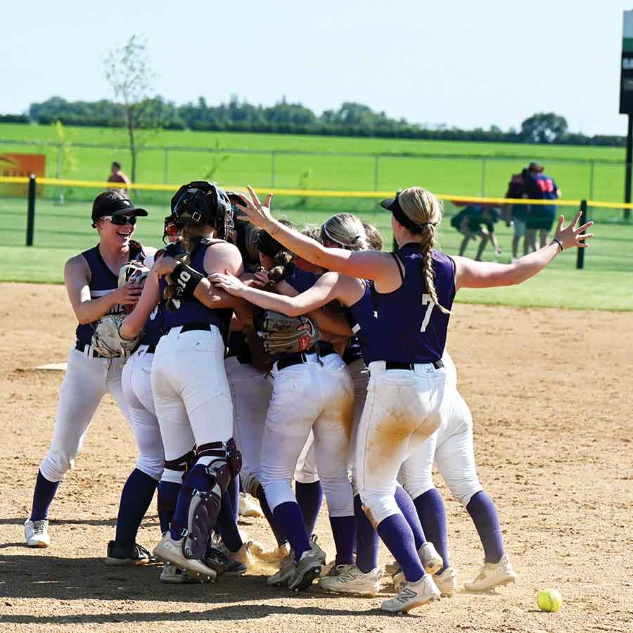 The Rams celebrate after defeating the St. Joachim Braves in the finals 9-2