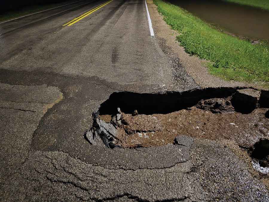 Southbound on Gimli Rd in Matlock at Bubbling Well Rd. This hole is 2 ft. deep