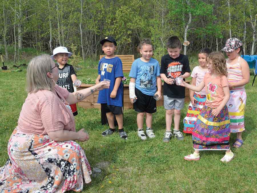 The kindergarten class releasing butterflies in honour of Tracia’s memory