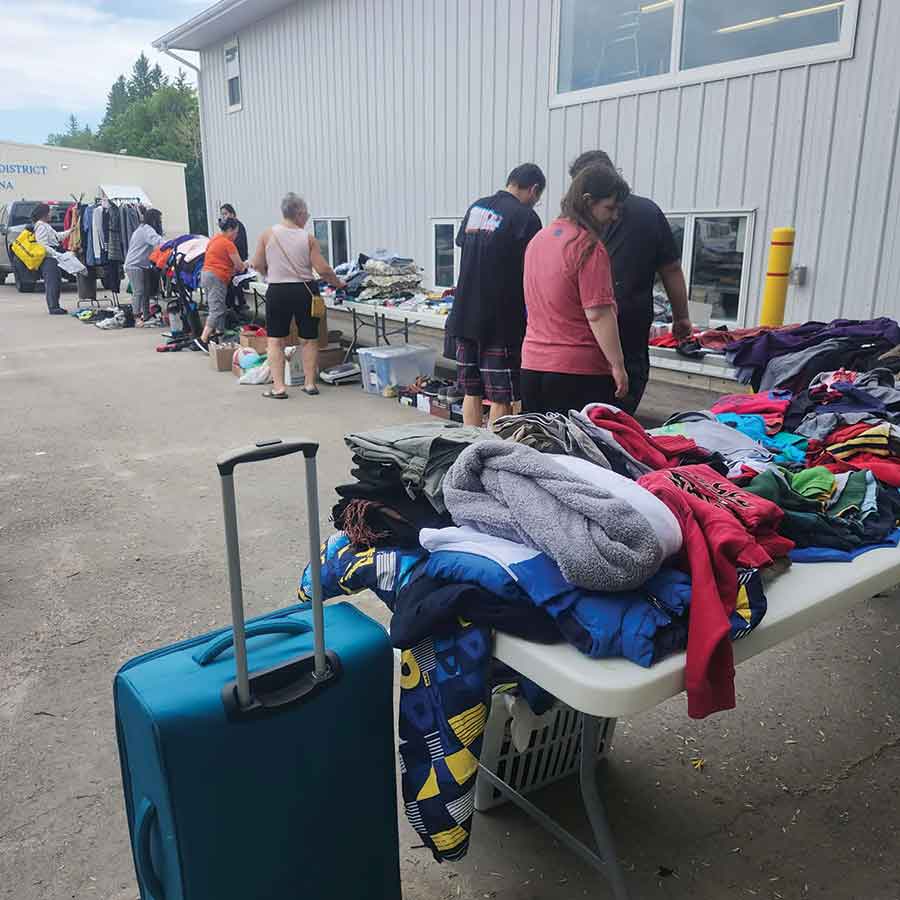 People browse for items at the garage sale. Members of the Filipino community came from as far as Thompson to help support the fundraising drive