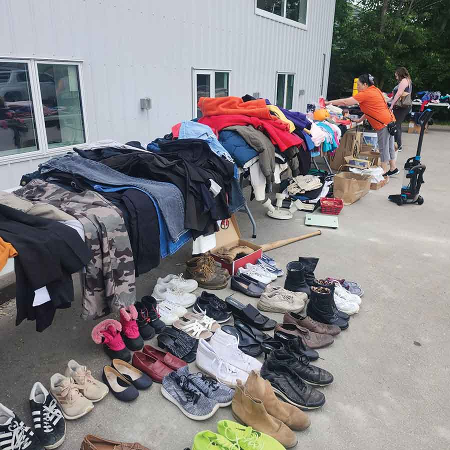 Shoes, clothing and other items for sale at the IFCMI garage sale