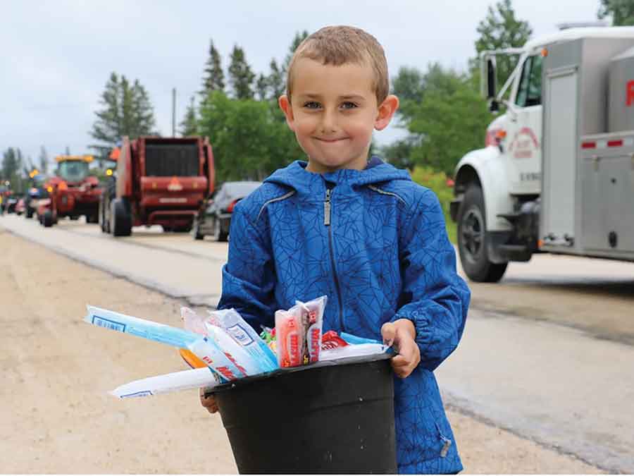 Residents lined the streets of Fraserwood on June 28 to watch the annual Fraserwood Hall Parade despite the rainy weather, with colourful floats, local organizations and community groups entertaining spectators