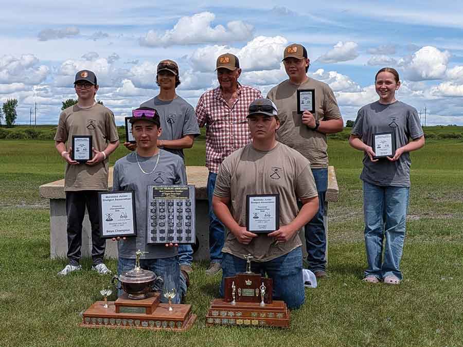 Lundar Trap Club shooters enjoyed a successful day at the Manitoba Junior Shotgun Association Provincial Championships in Brandon on June 21, earning an overall provincial title along with several podium finishes. Pictured, left to right, back row: Finn Bieri, Kai Deogracias, Donnie Law (Lundar Gun Club president),Decklen Meisner, Ava Bieri; Front row: Logan Halldorson and Holden Bieri
